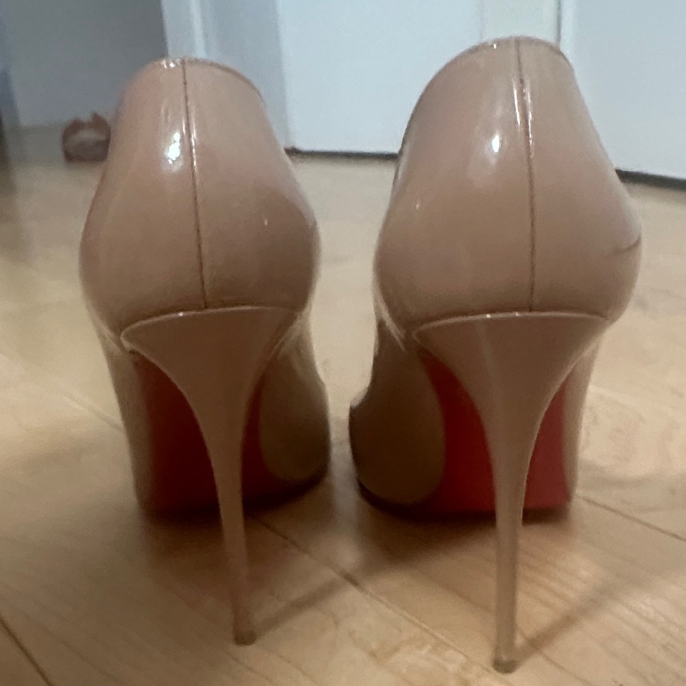 Christian Louboutin Nude Heels with Red Soles